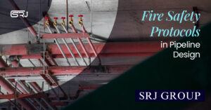 A complex network of red and grey industrial pipes with multiple red-handled valves running across a concrete ceiling. The text "Fire Safety Protocols in Pipeline Design" and "SRJ GROUP" is overlaid.