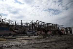 Collapsed steel structure at an industrial construction site due to structural failure.
