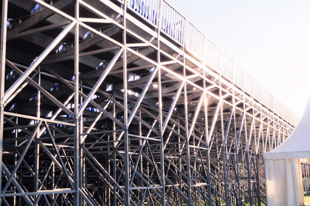 Close-up of interconnected steel truss members with visible bolted joints