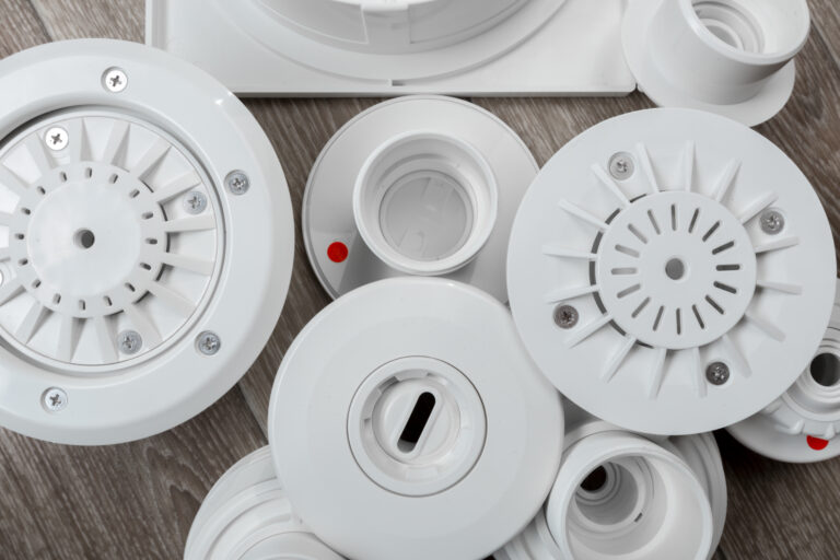 Smart fire detection devices comparing smoke and heat sensor technologies.